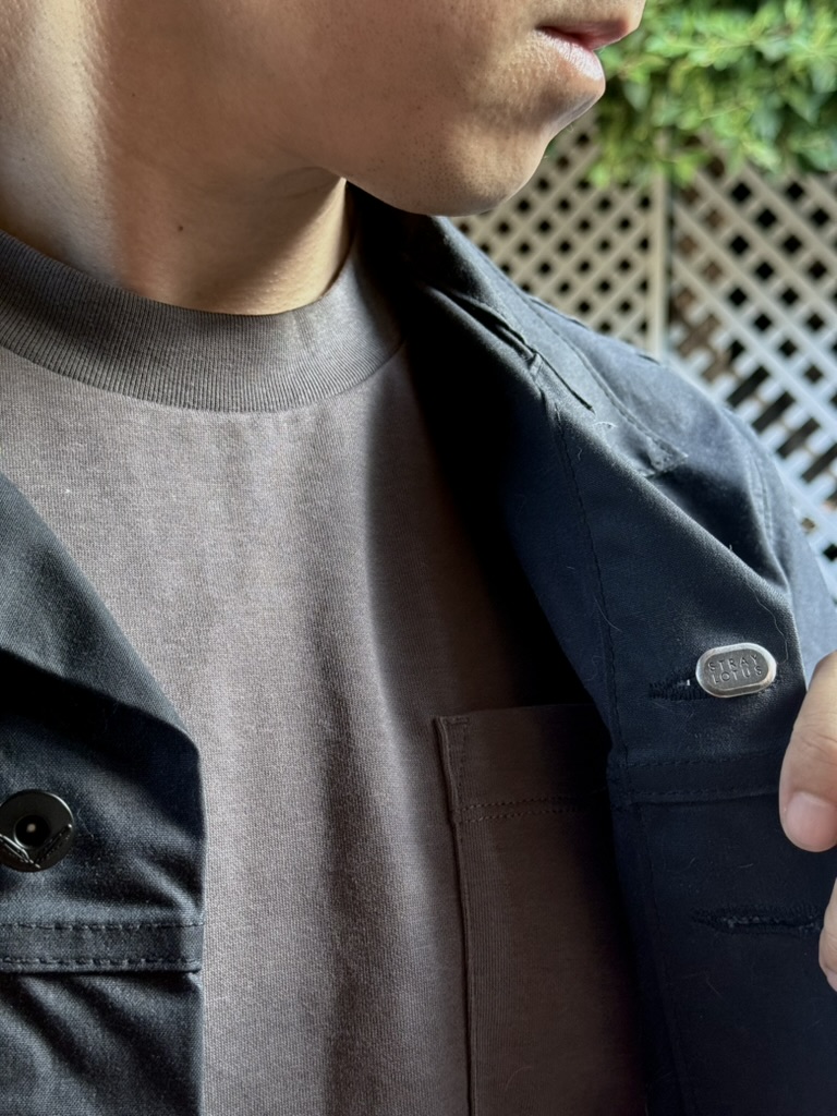 The Stray Lotus backstamp showing on the reverse of Lotus 001 while worn